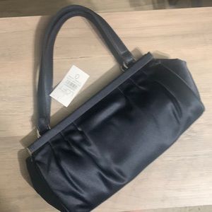 Small, black purse by Ann Taylor the Loft